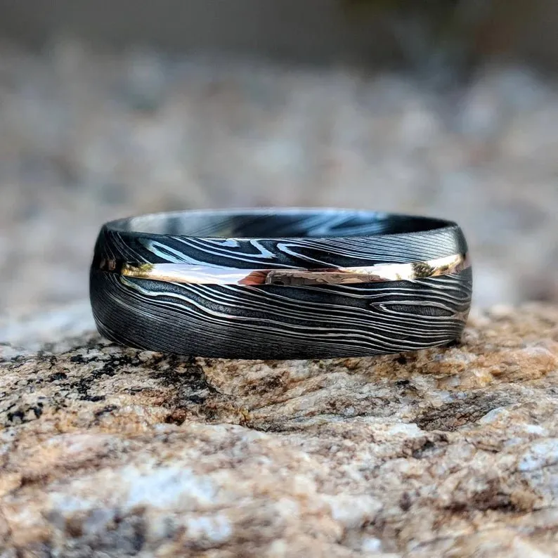 A Touch of Luxury: Authentic Damascus Steel Wedding Band with 14k Rose Gold Inlay